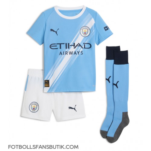 Manchester City Erling Haaland #9 Replika Hemmatröja Barn 2025-26 Kortärmad (+ Korta byxor) Manchester City Erling Haaland #9 Replika Hemmatröja Barn 2025-26 Kortärmad (+ Korta byxor)